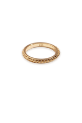 Special twisted design gold ring with white background