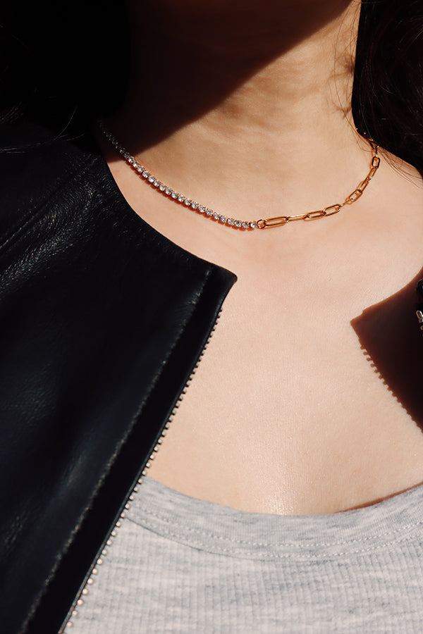 Minimalist gold half zircon necklace worn alone, ideal for everyday styling or layering.