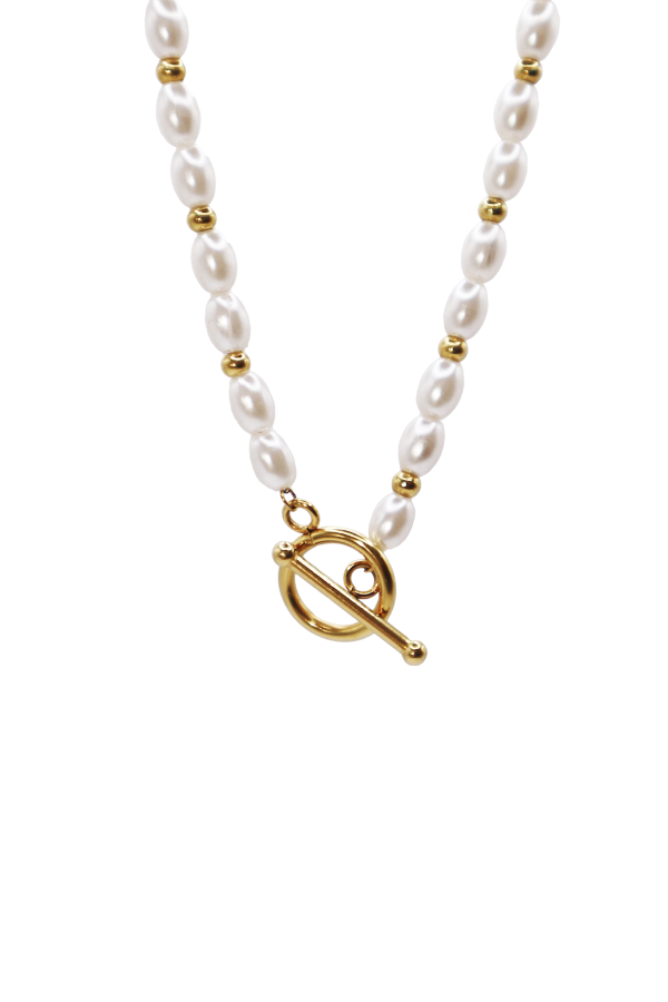 Close up of pearl necklace with gold beads, perfect summer accessory
