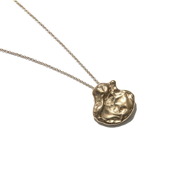 Close up gold necklace