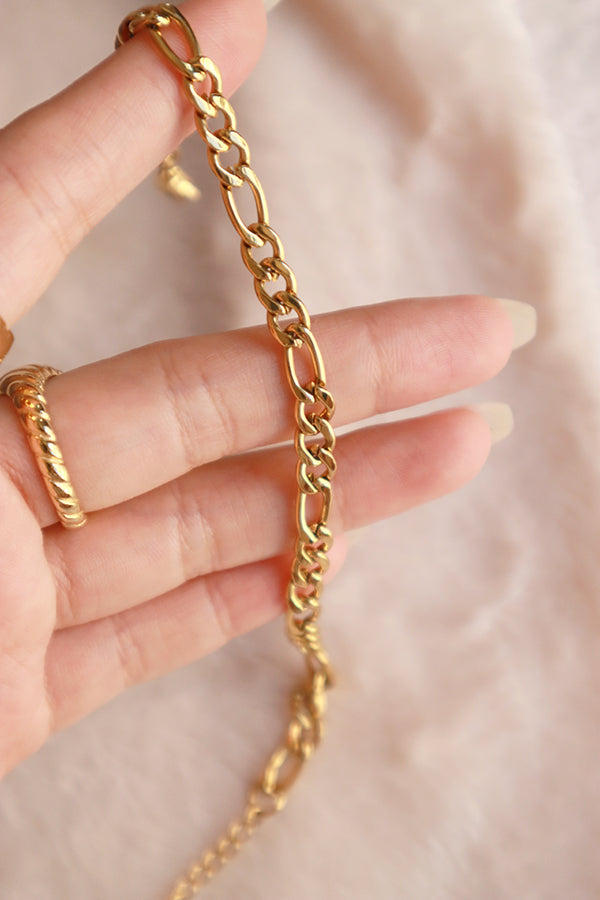 Woman shows the details of the bracelet to camera