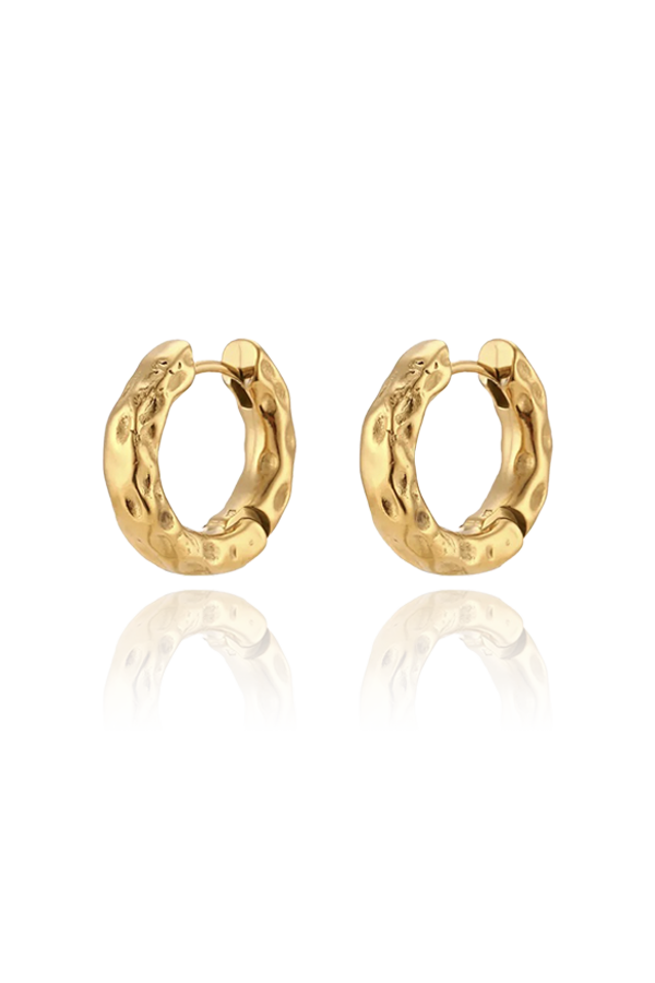 A pair of large, chunky gold hoop earrings with a distinctive hammered or textured finish, shown without background.