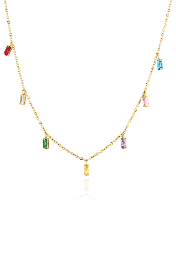 A product image of a gold chain necklace laid flat, showcasing its colorful cubic zirconia stones. The stones are set in a linear arrangement, with each stone in a different color, giving the necklace a vibrant and eye-catching appeal. The gold chain complements the multicolored stones, making it a stylish and versatile piece for any jewelry collection.