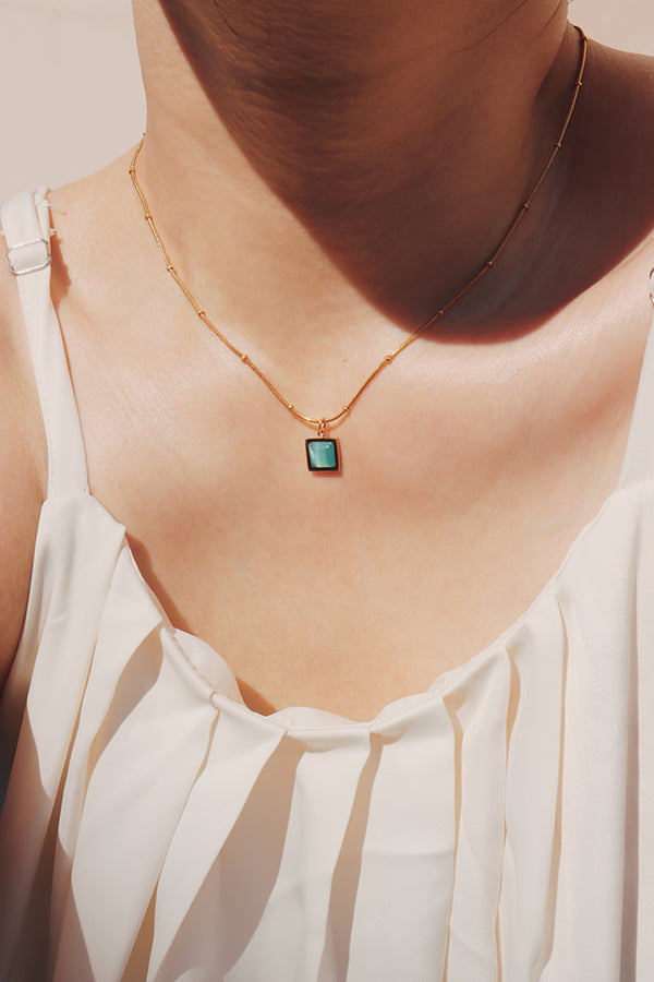 Erin Cat's Eye Necklace featuring a beautiful blue pendant