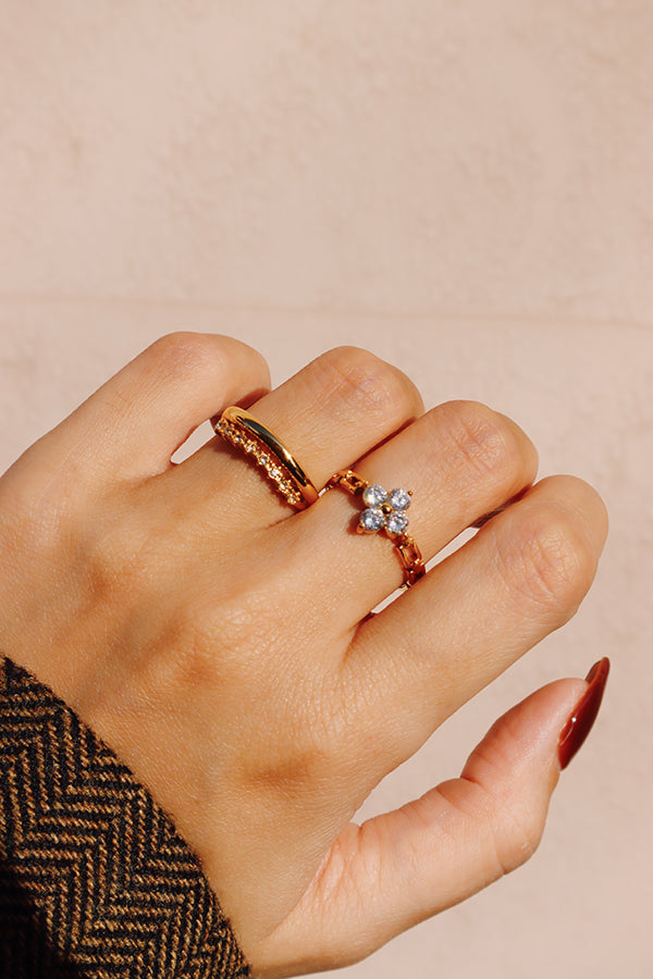 Stackable flower ring made of 18K gold plated stainless steel, tarnish resistant and hypoallergenic for daily wear.