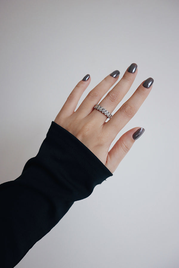 Minimal silver crystal statement ring featuring a full row design, styled for an effortless everyday outfit.
