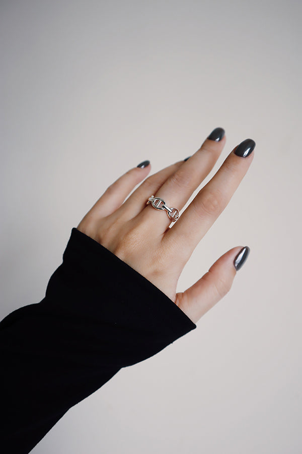 Silver open band ring with a smooth polished finish, designed for a comfortable adjustable fit.