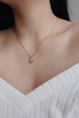 Woman wearing tarnish free necklace that perfect for layering looks
