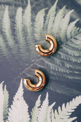 Simple and bold gold hoops, a water-resistant and hypoallergenic choice for woman