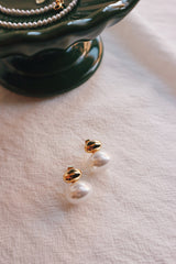 Vintage vibes pearl jewelry pieces on the table