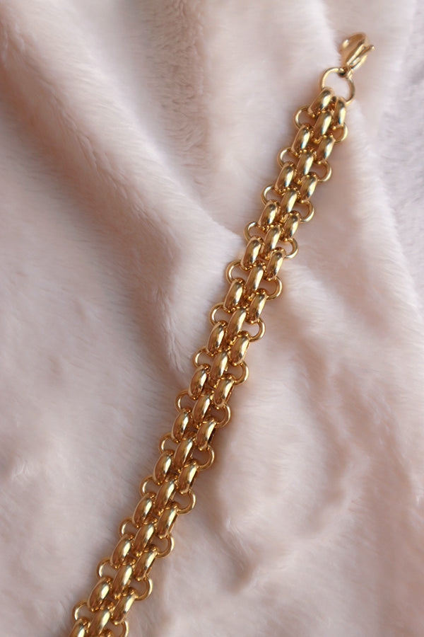 New trend gold plated bracelet put on the white cloth
