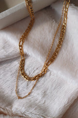 Figaro layered necklace on the white blanket