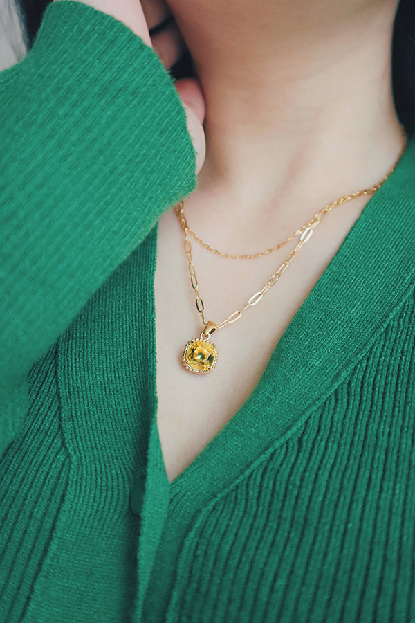 Vintage-inspired gold-plated necklace adorned with dazzling cubic zirconia stones for a stylish appearance.