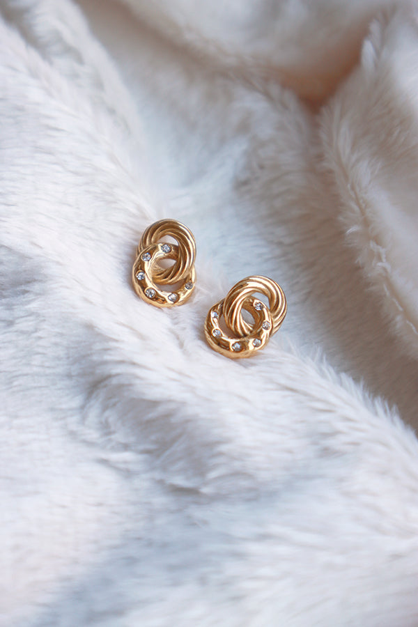 Gold plated linked circle earrings close up