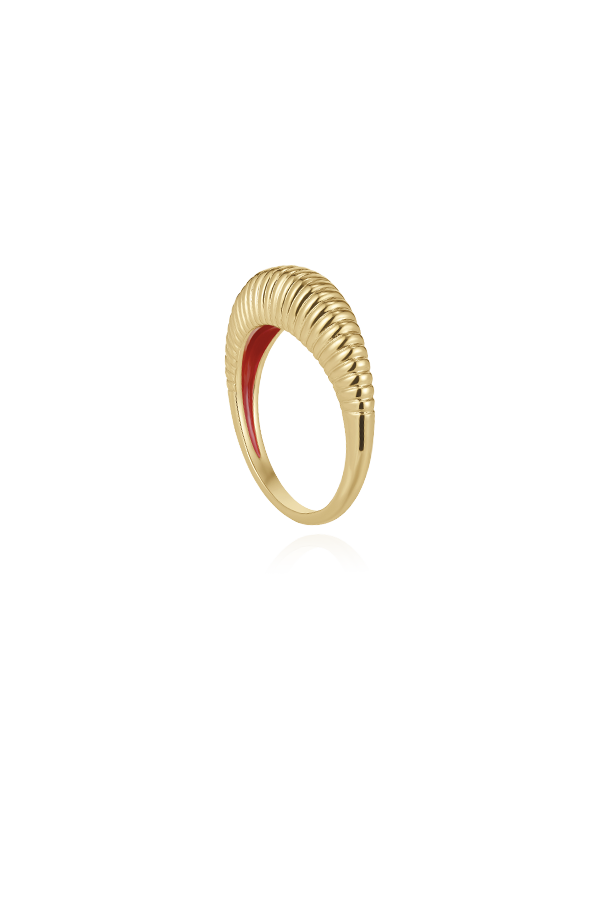 Ribbed gold ring with red color on the inside 