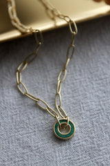Gold chain round malachite hollow necklace on a gold plate