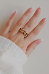 Girl wearing fashionable trendy gold ring for daily outfit