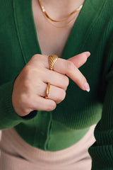 Woman wearing perfect gold jewelry for dating outfit