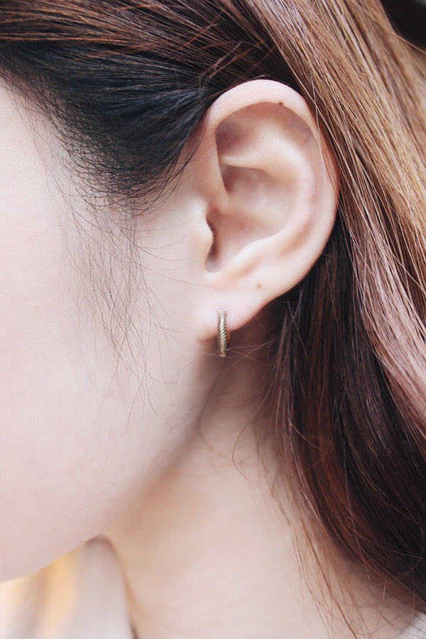 Dainty textural gold huggies for everyday wear