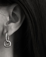 Model wearing evet hoop earrings shot in black and white