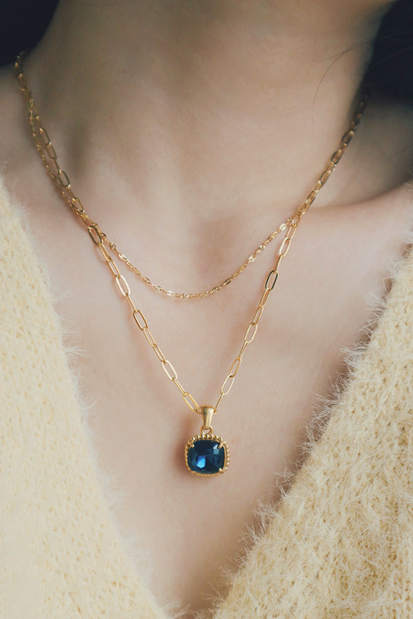 Alluring vintage cubic zirconia necklace, ideal for layering with other pieces, featuring a hypoallergenic, non-tarnish, and water-resistant gold-plated chain.
