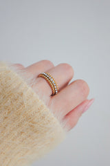 Eye-catching, gold-plated ring with glistening cubic zirconia accents for a luxurious appearance.
