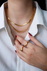 High quality basic gold necklaces on the female model's neck