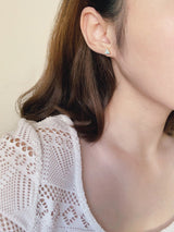 Opal triangle studs from SH & Co.